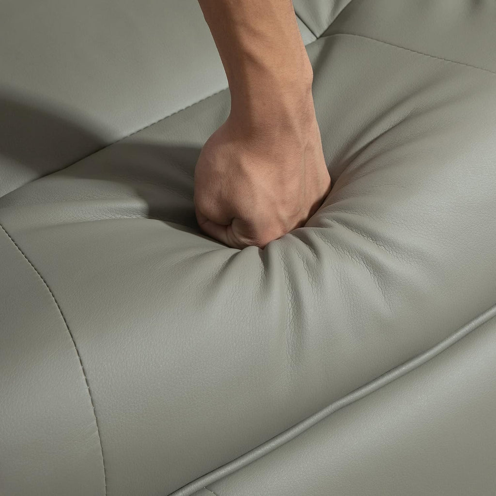 Swivel recliner. PU leather recliner featuring a retractable footrest.