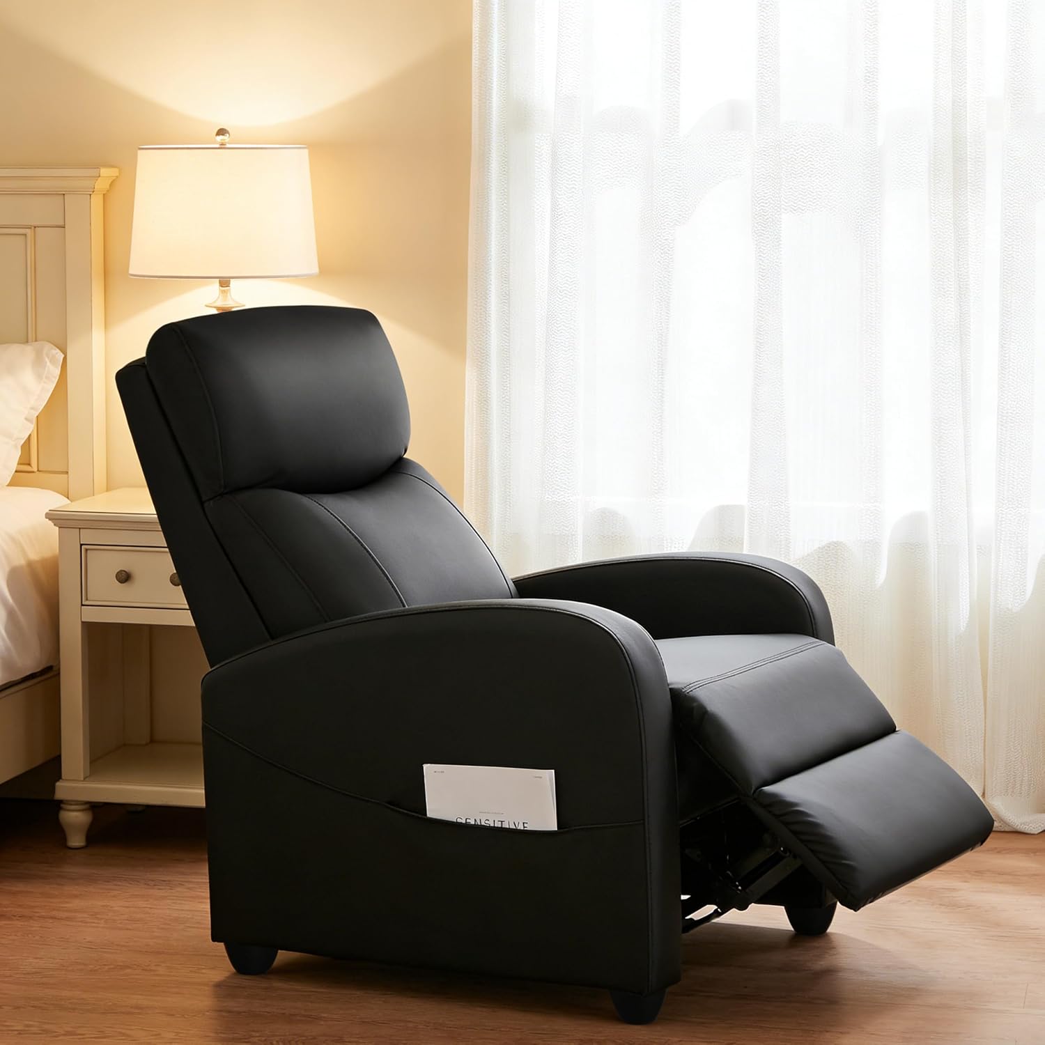 Minimalist Recliner—Adjustable PU Leather Recliner.